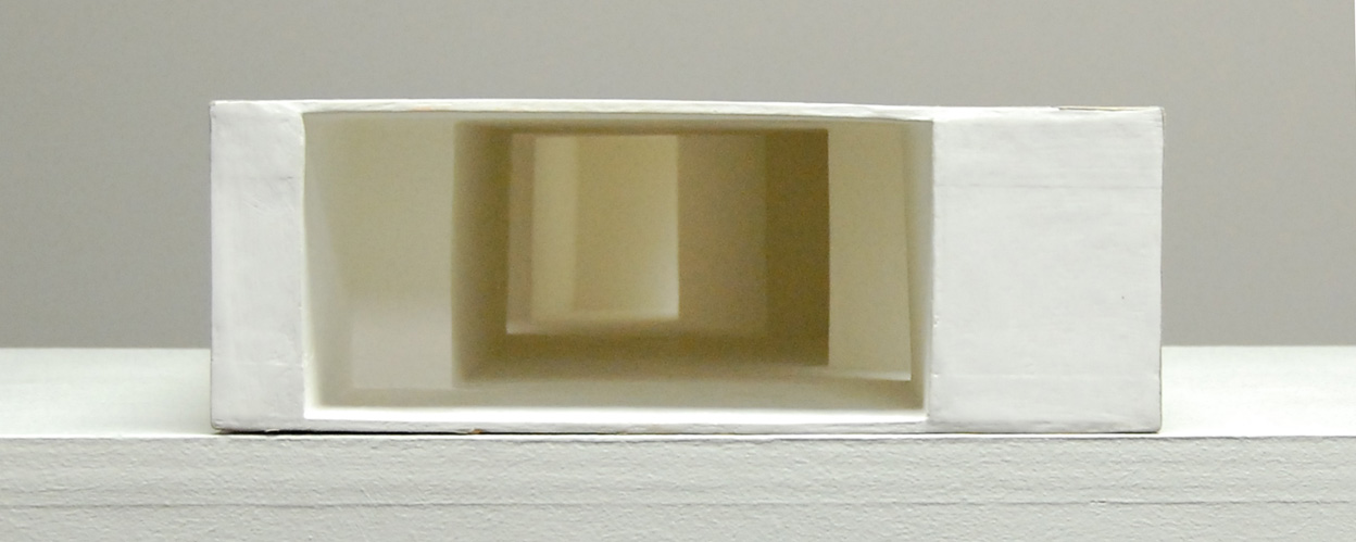 black and white photo of man looking at pie selection