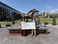 Pictured from left are Meghan Carnevale, Director of Corporate & Foundation Relations at Marywood University, and Mark DeStefano, CPA, MSHA, Chief Financial Officer of Pagnotti Enterprises, Inc., during the presentation of an $11,000 Educational Improvement Tax Credit (EITC) donation in support of Marywood University's Momentum Program.