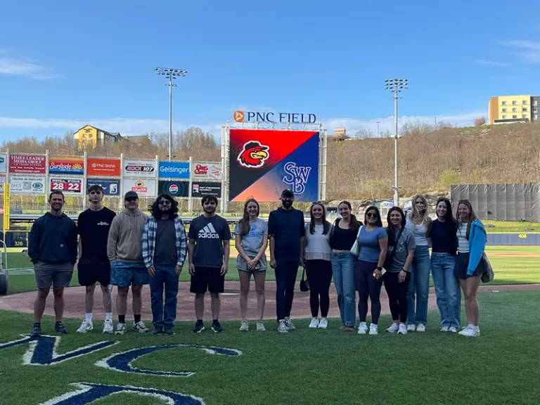group of class on the baseball field