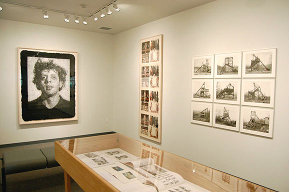 A room with art exhibitions from various artists