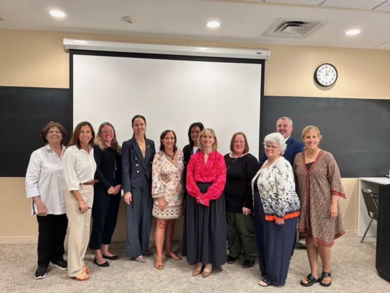 group of people with council people at a roundtable discussion